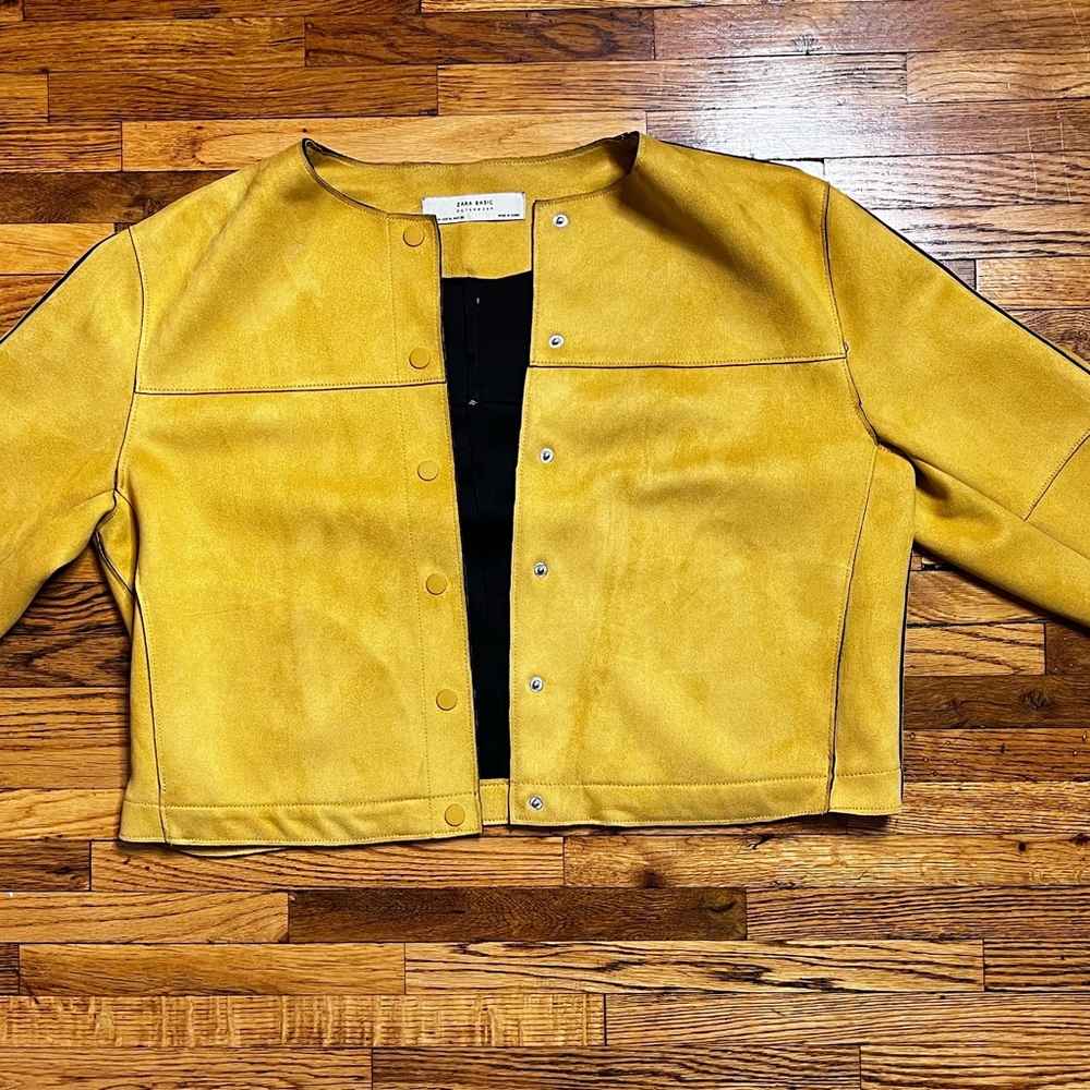 Yellow microsuede bolero styled jacket.